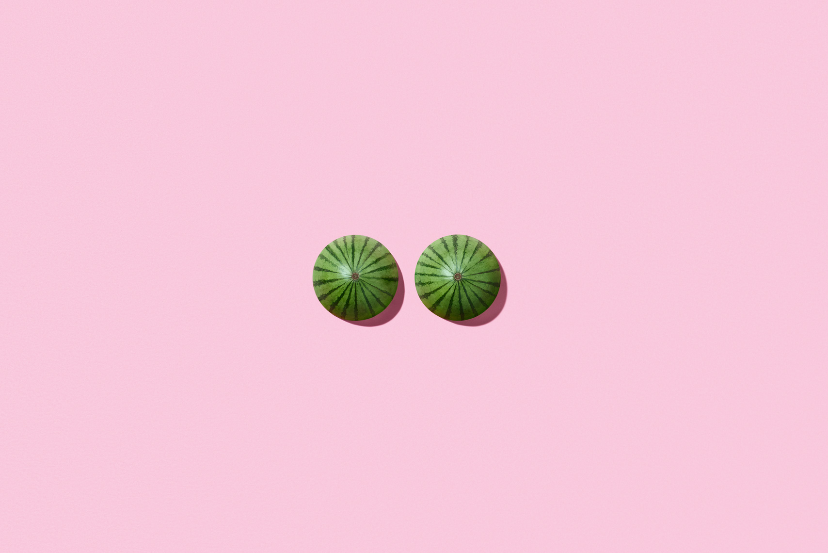 Melons. Conceptual still life photography with a minimal style and quirky humor