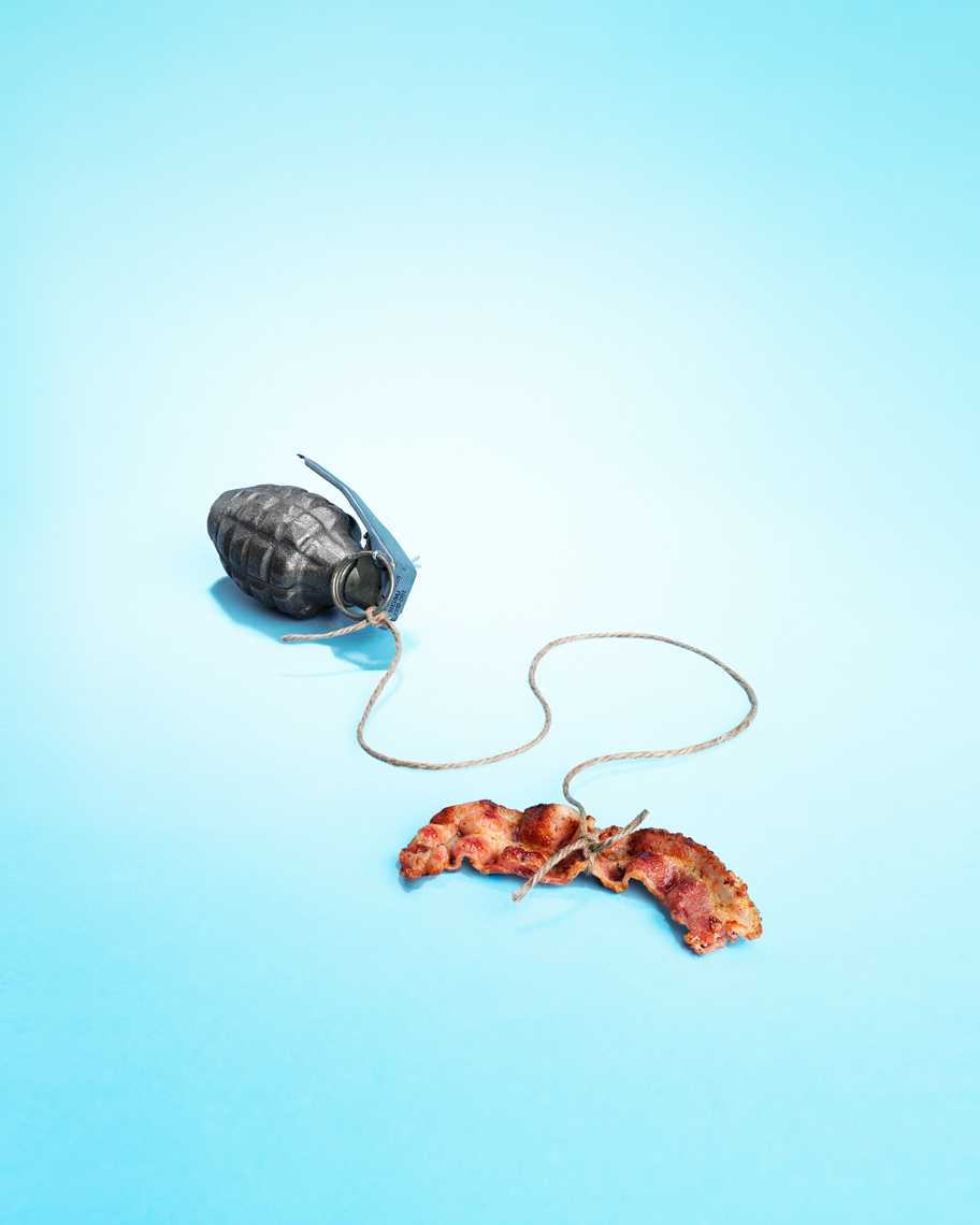 A piece of bacon tied to a hand grenade